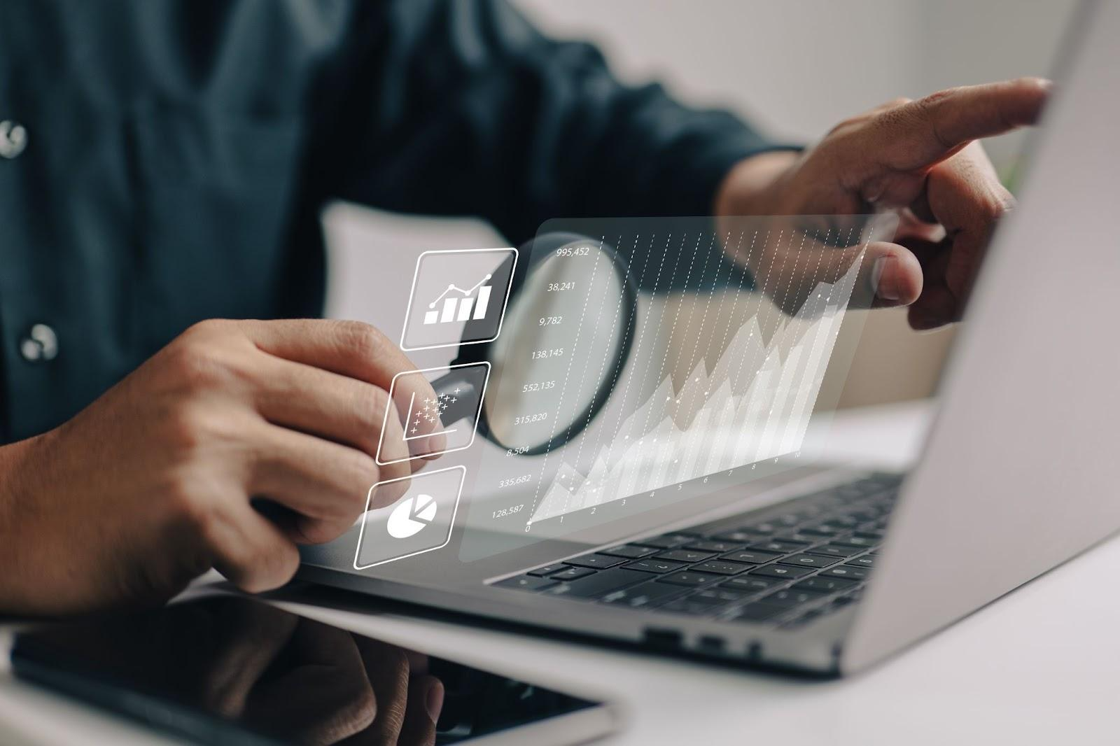 man using a magnifying glass to look at a website